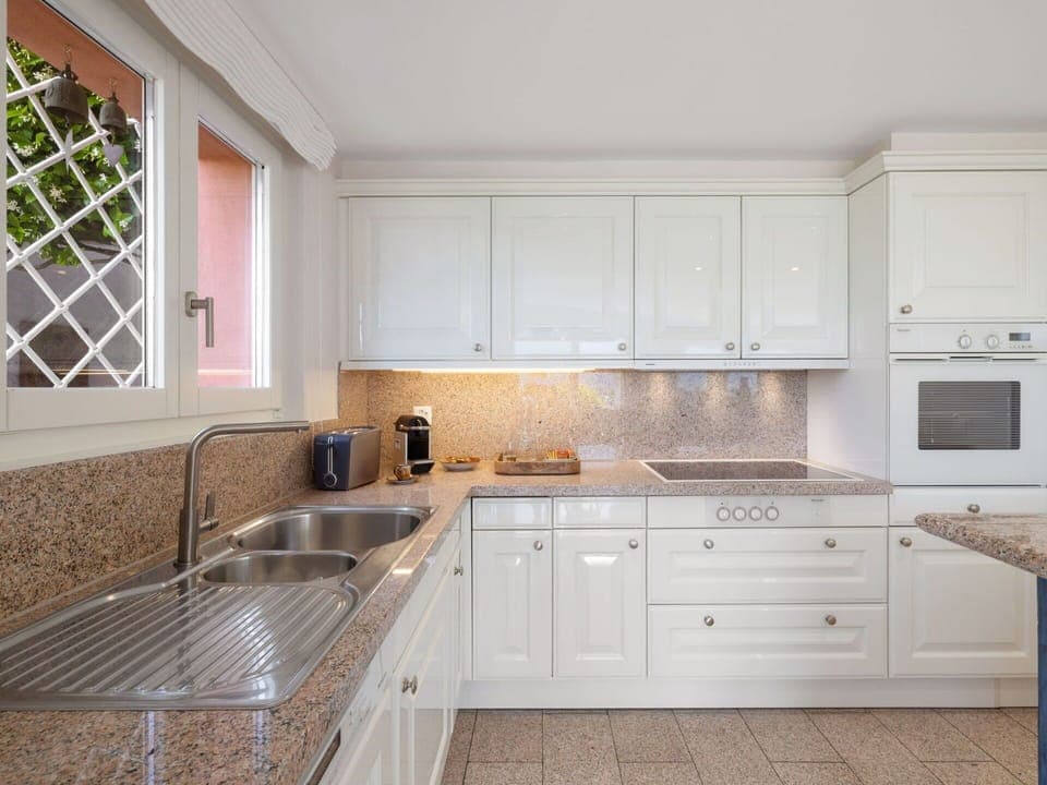 Kitchen, Countertop, Cabinetry, Kitchen Appliance, Interior Design, Major Appliance, Plumbing Fixture, Sink, Kitchen Sink, Flooring