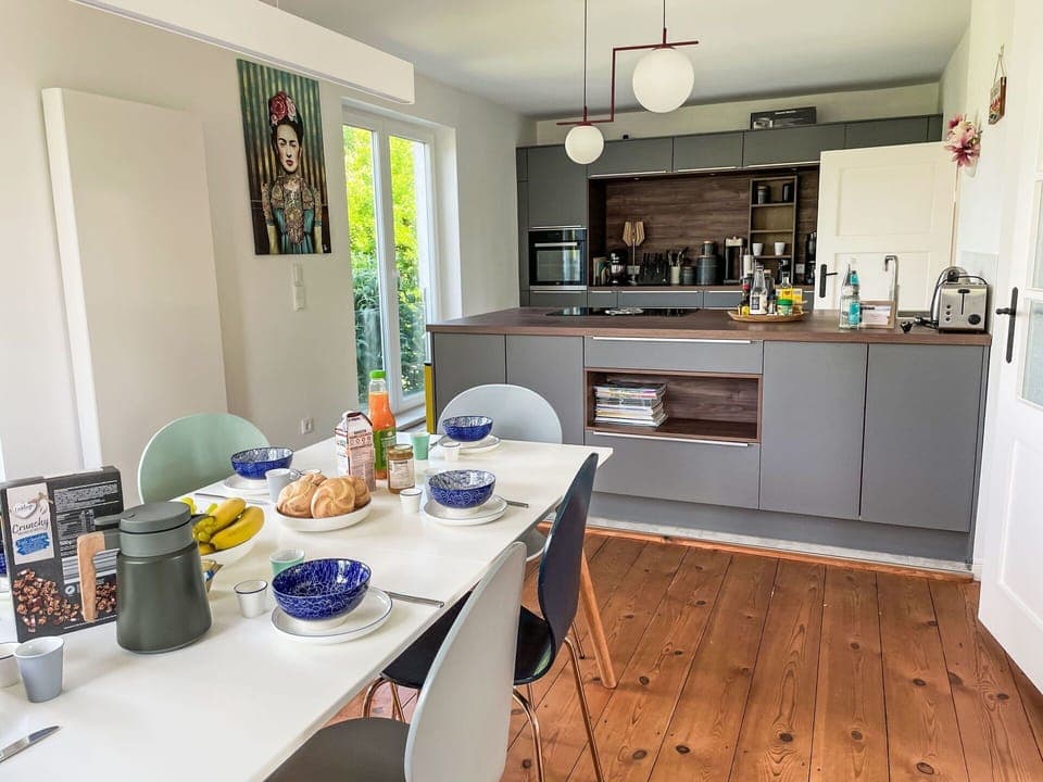 Kitchen, Kitchen Appliance, Countertop, Furniture, Interior Design, Flooring, Major Appliance, Cabinetry, Wood, Home Appliance