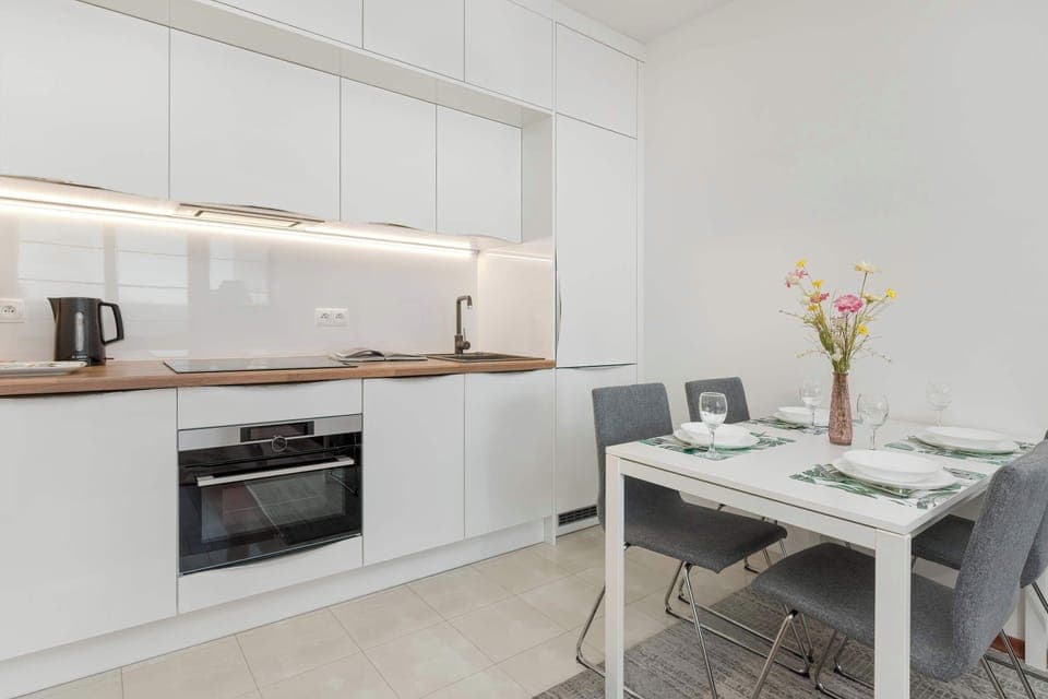 The fully equipped kitchenette includes everything you need for a home-cooked meal.