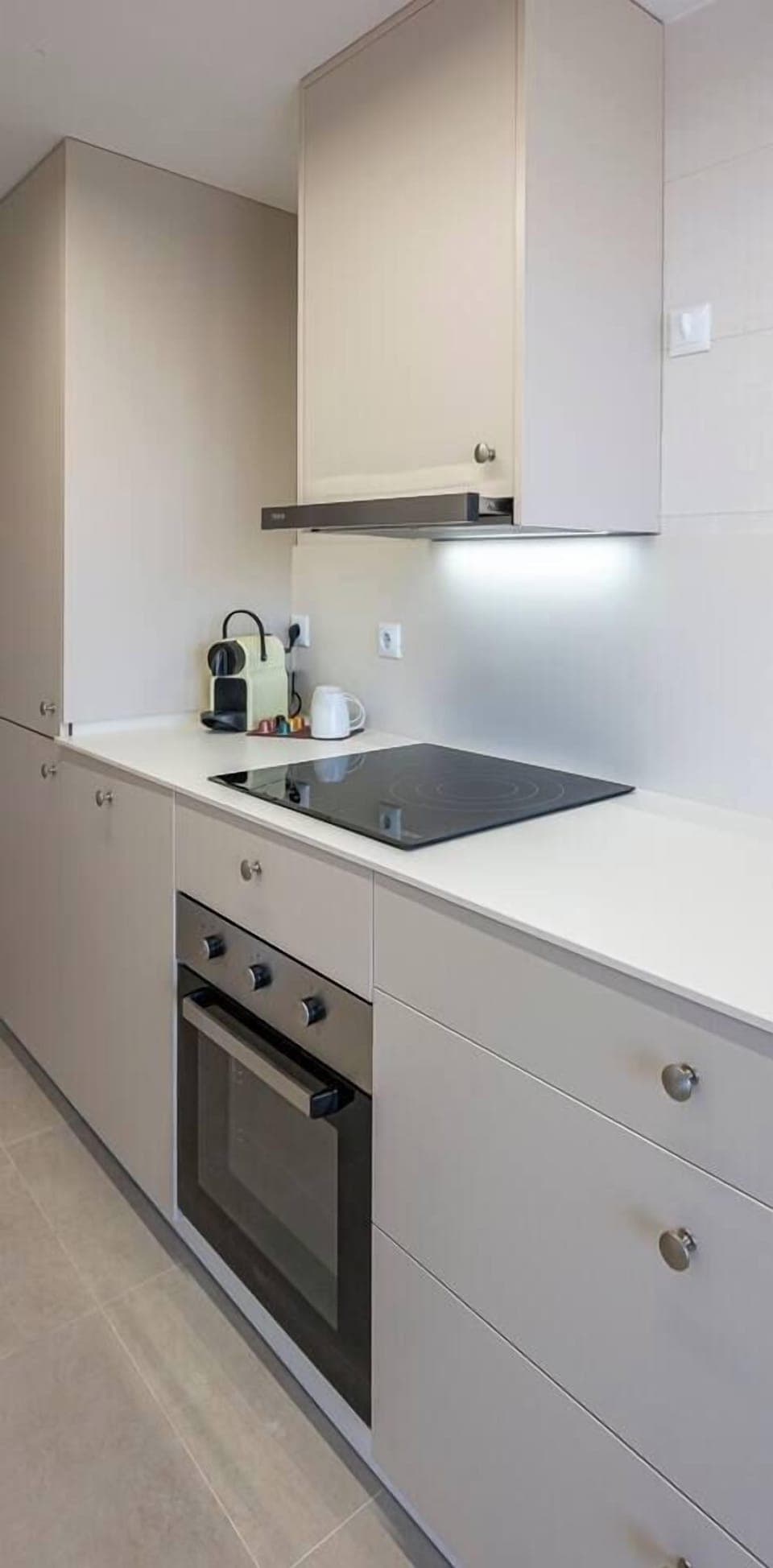 Kitchen with washer and ample storage. (1)