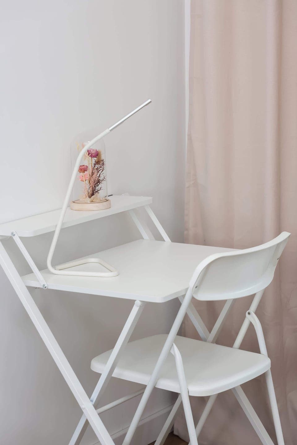 A small table with chairs is perfect for morning coffee or quick laptop tasks.