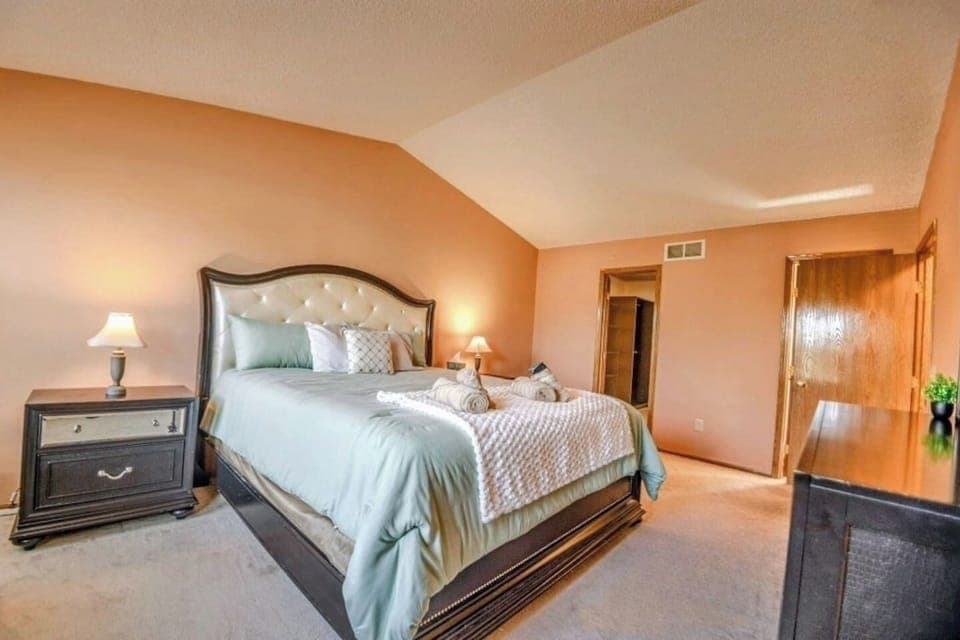 Large Master ensuite with huge California king bed fit for a king and/or queen!