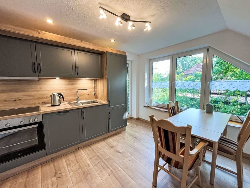 Flooring, Wood, Interior Design, Furniture, Countertop, Kitchen, Floor, Wood Flooring, Ceiling, Kitchen & Dining Room Table