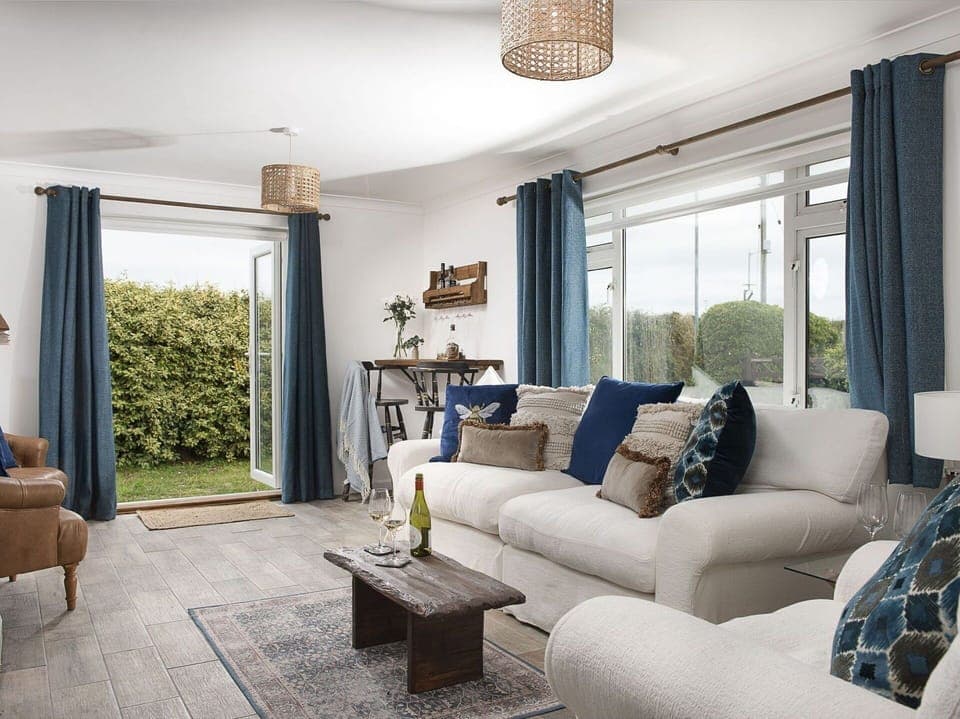 Furniture, Interior Design, Couch, Wall, Flooring, Living Room, Room, Wood, Floor, Ceiling