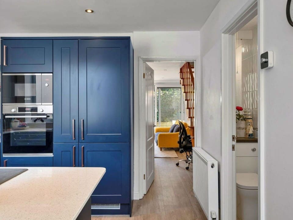 Furniture, Interior Design, Flooring, Cabinetry, Countertop, Wood, Floor, Kitchen Appliance, Kitchen, Ceiling