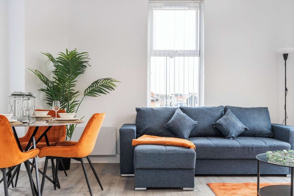 Interior designed and modern, the living room comes a equipped with a comfy pullout double sofa bed