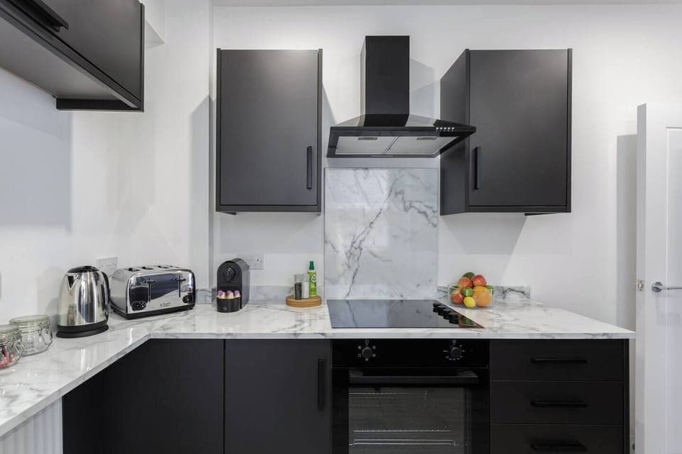 Modern, fully equipped kitchen with everything you need – including coffee fix essentials.