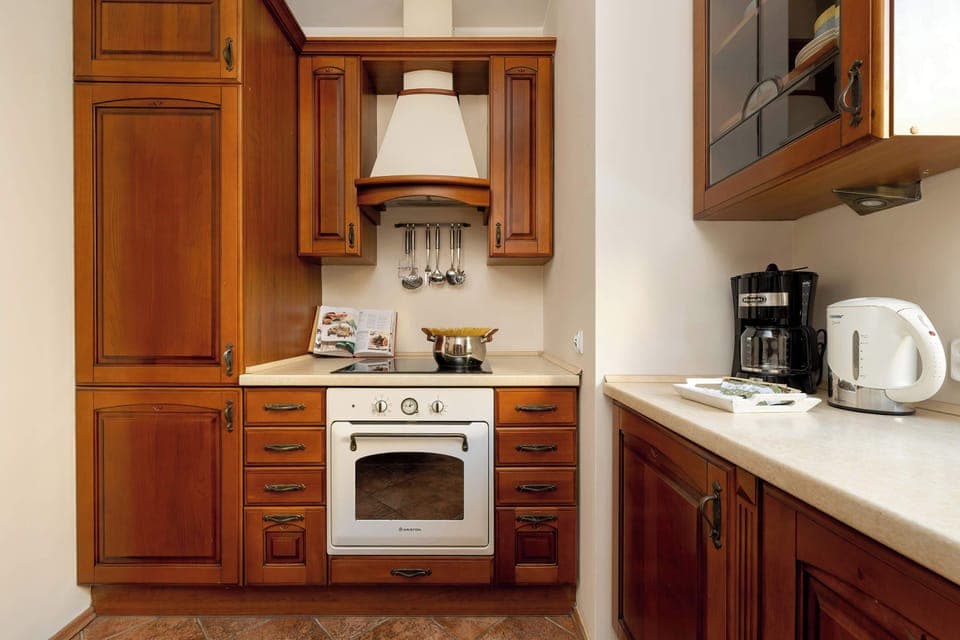 Appliances such as a fridge, oven and hob provide comfort.