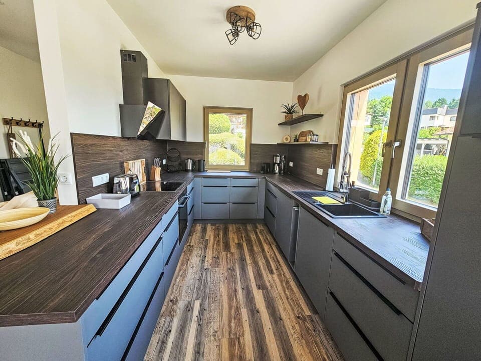 Flooring, Countertop, Kitchen, Wood, Cabinetry, Furniture, Interior Design, Floor, Kitchen Appliance, Wood Flooring