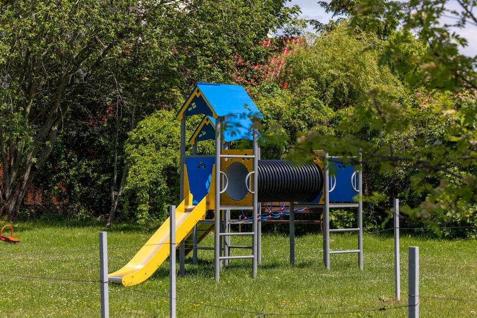 Space for children located next to the property building.