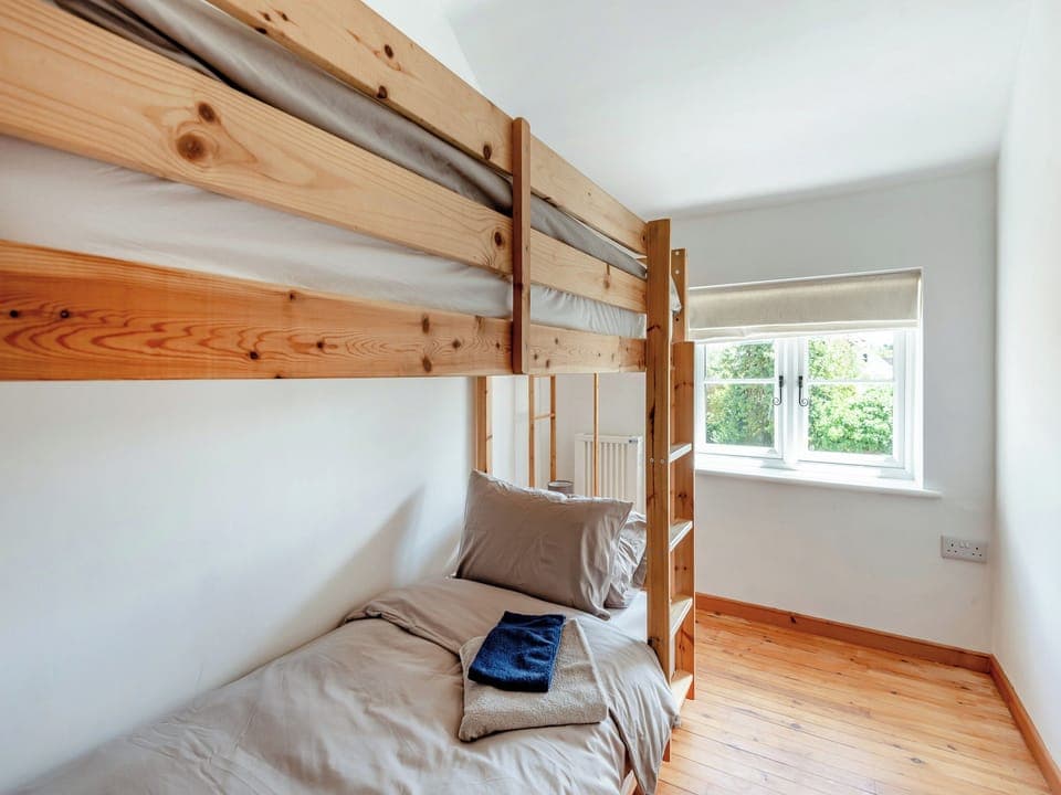 Bunk bedroom | The Pink Cottage, Bottisham