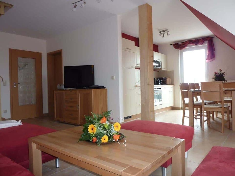 Wohnzimmer mit Küche