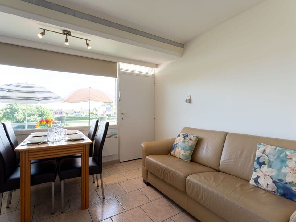 Furniture, Interior Design, Flooring, Floor, Wood, Ceiling, Couch, Room, Lighting, Table