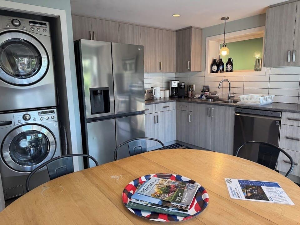 Modern bright kitchen, fully-stocked with everything you need for cooking.