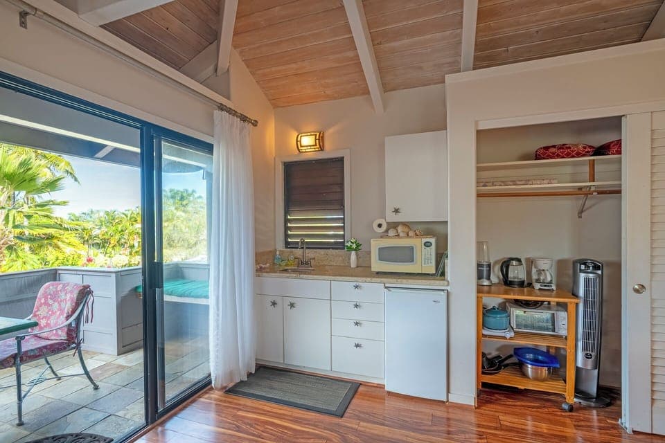 Kitchen with micro, mini fridge, and accesories in closet