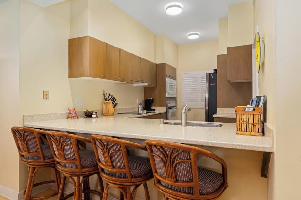 Hang out on the bar seating for four