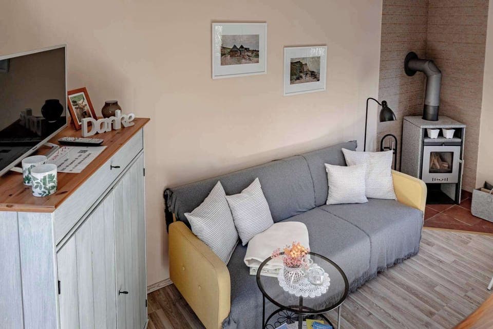 Wohnzimmer - Sofa & Kamin