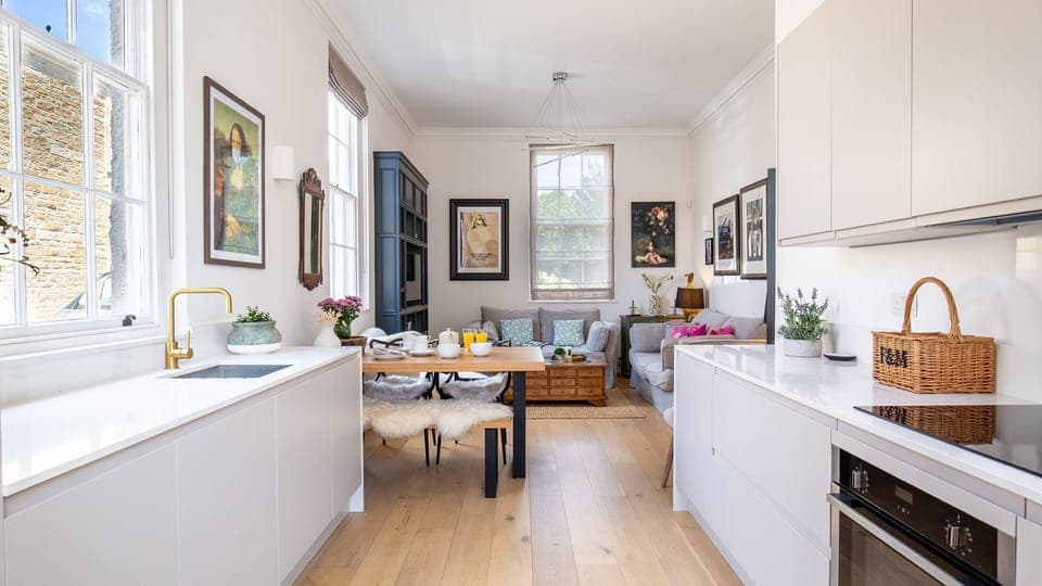 The open plan living area has been cleverly split into three zones.