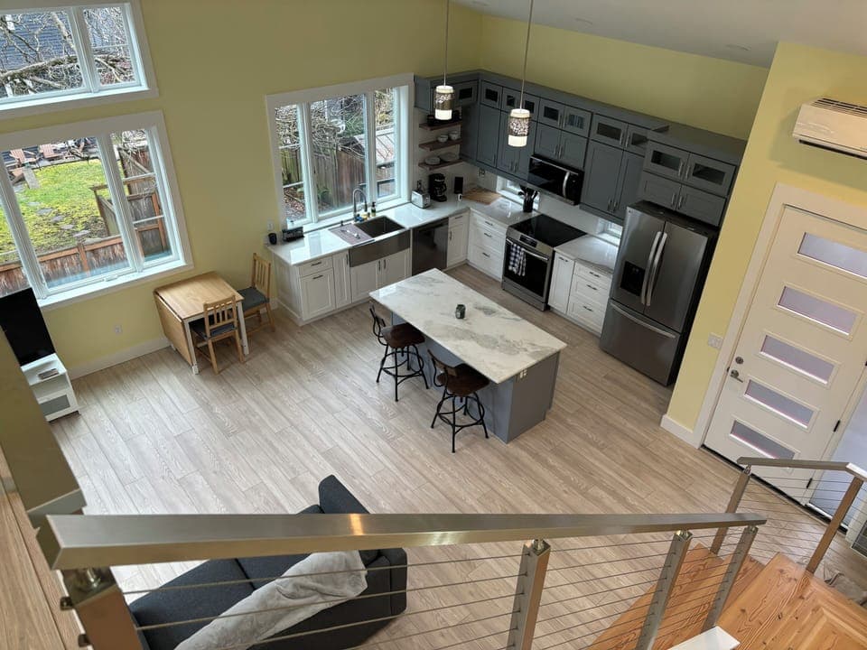 Main floor as seen from upstairs landing. 