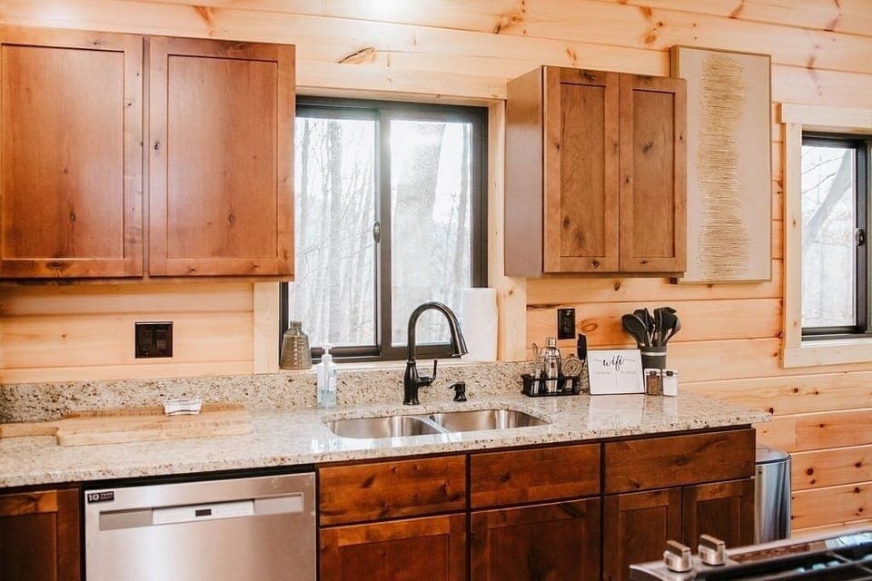 Fully stocked kitchen with granite counters and coffee included