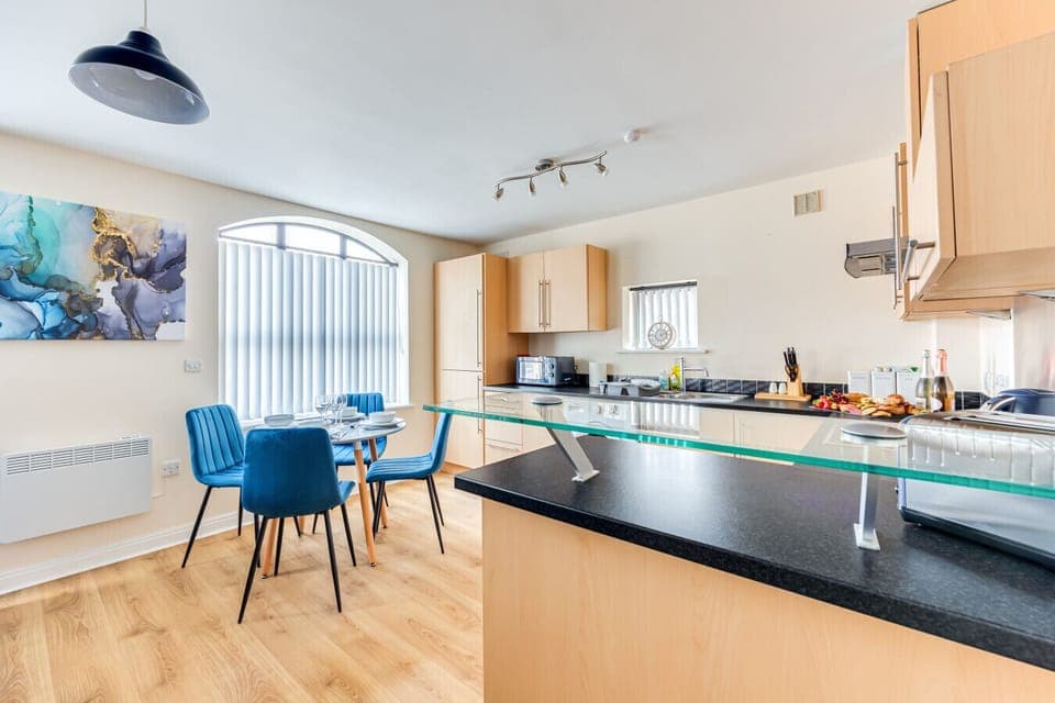 Dining area with seating for up to 4 guests.