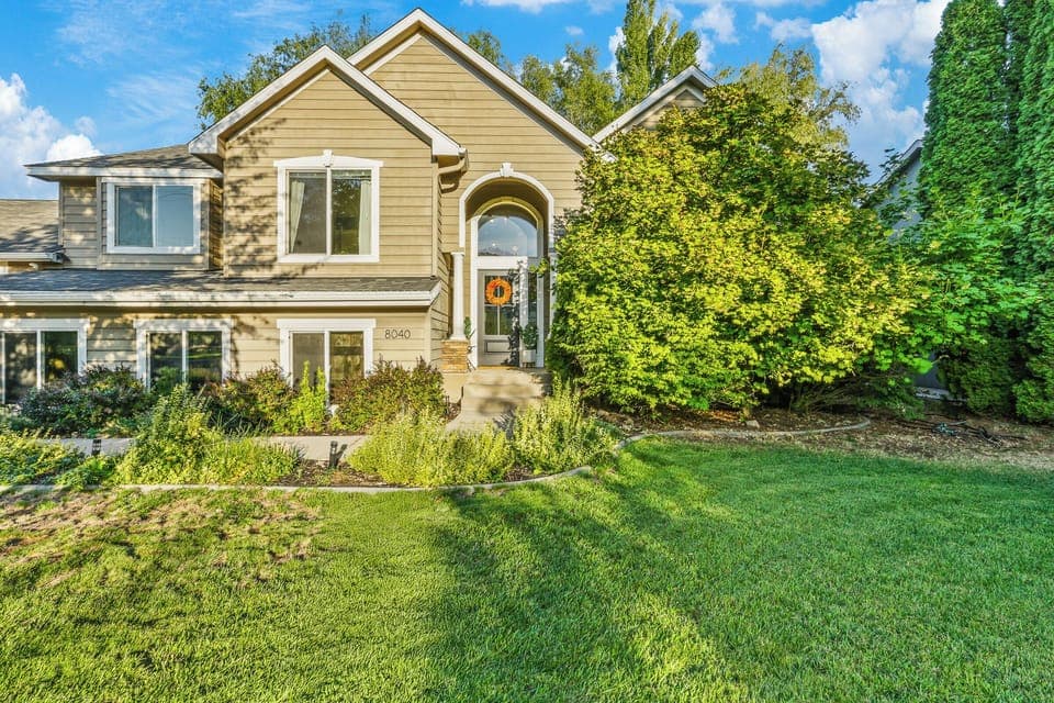 Peaceful family retreat near Spokane with large lawn and inviting curb appeal