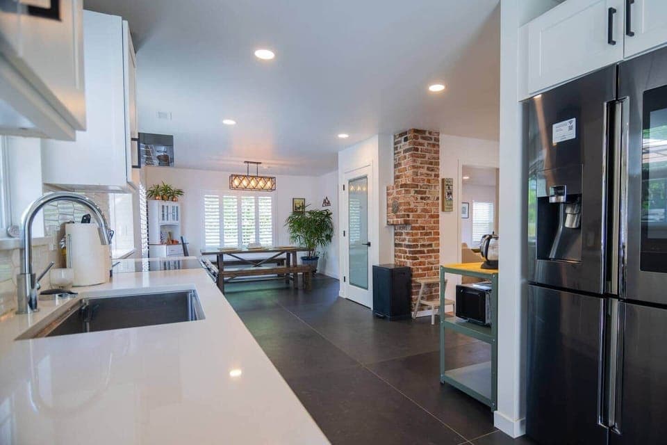 Expansive kitchen awaits your gourmet creations with the latest appliances and equipment