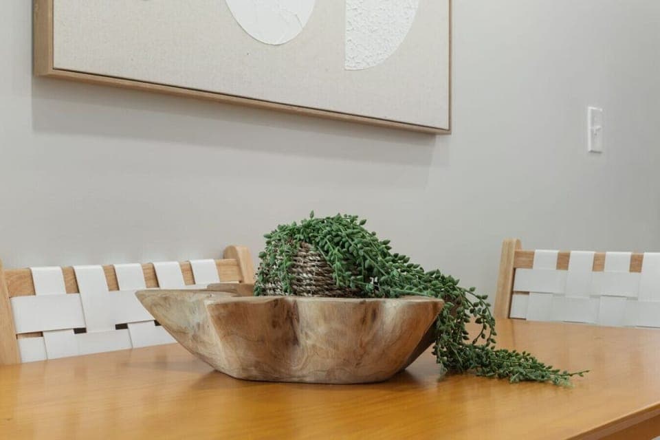 Dining table with seating for shared meals or game nights.