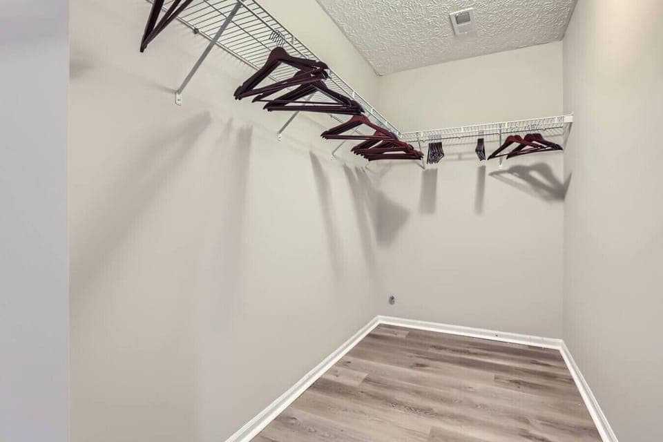 A spacious wardrobe offering ample storage for clothing and personal items.