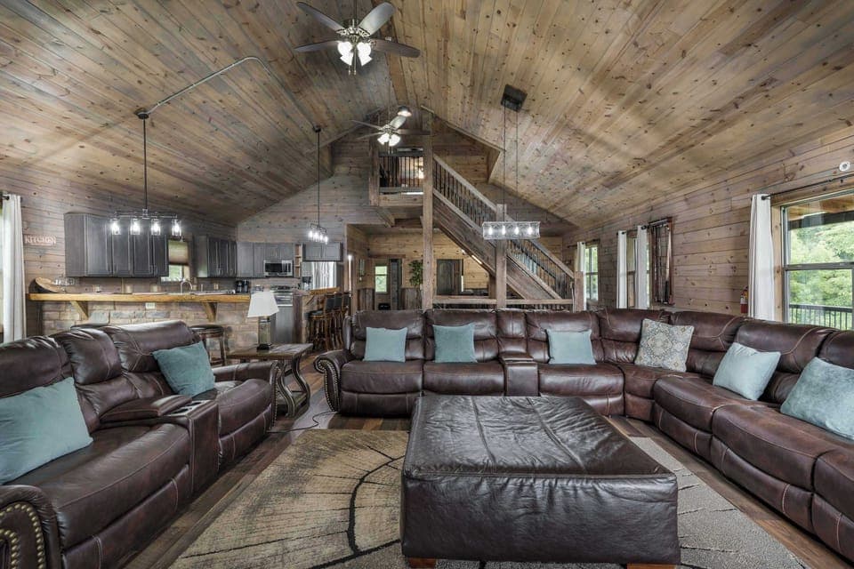 The open floor plan connects the living, dining, and kitchen areas into one welcoming space—perfect for entertaining, relaxing, or keeping everyone connected no matter where the fun is happening.