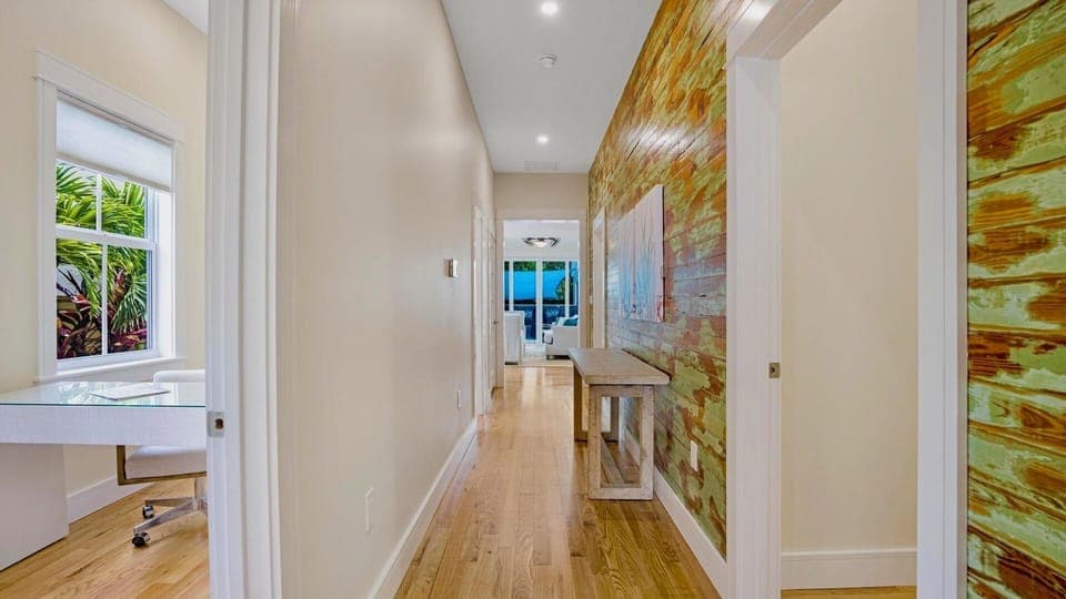 Hallway to bedrooms and home office...