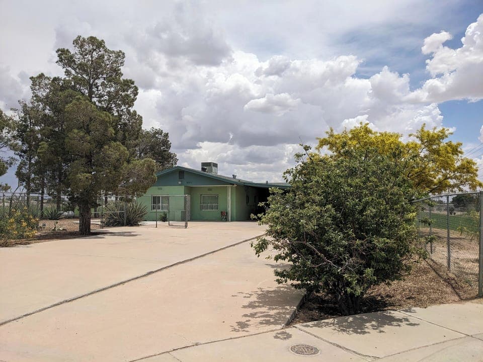 View from the road, including the long driveway and extra parking!