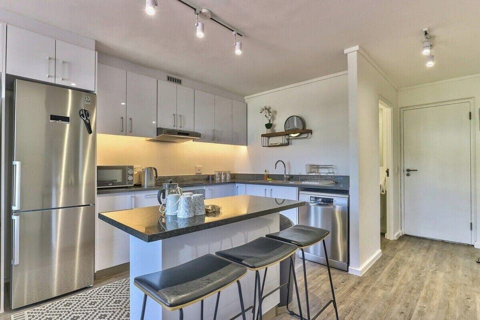 Open plan Kitchen with dining island- perfect for an inclusive family meal!