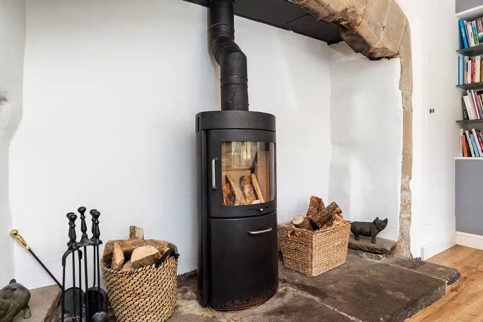 the kitchen Inglenook fireplace, this is a smaller fire.