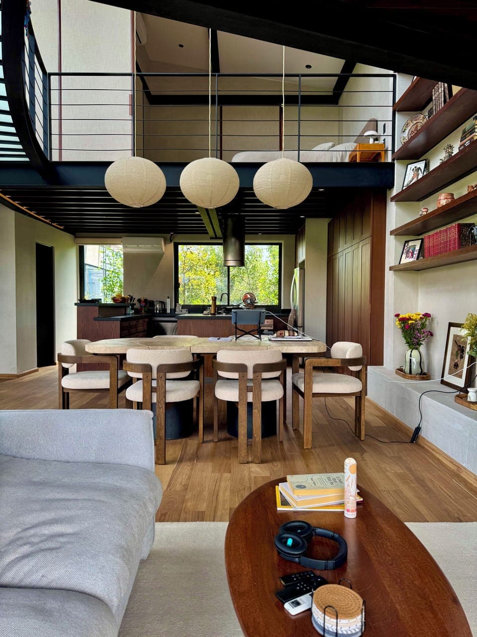 Dining w/ above BR doors open.  Custom steel and marble table, walnut chairs