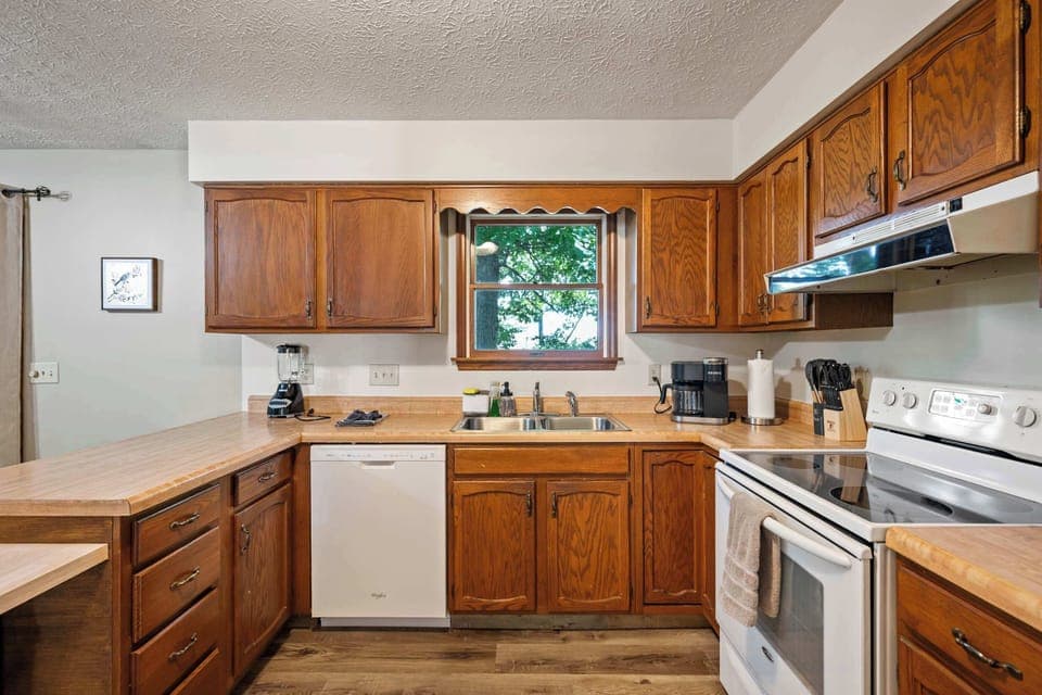 The inviting kitchen offers ample space & all the comforts of home​