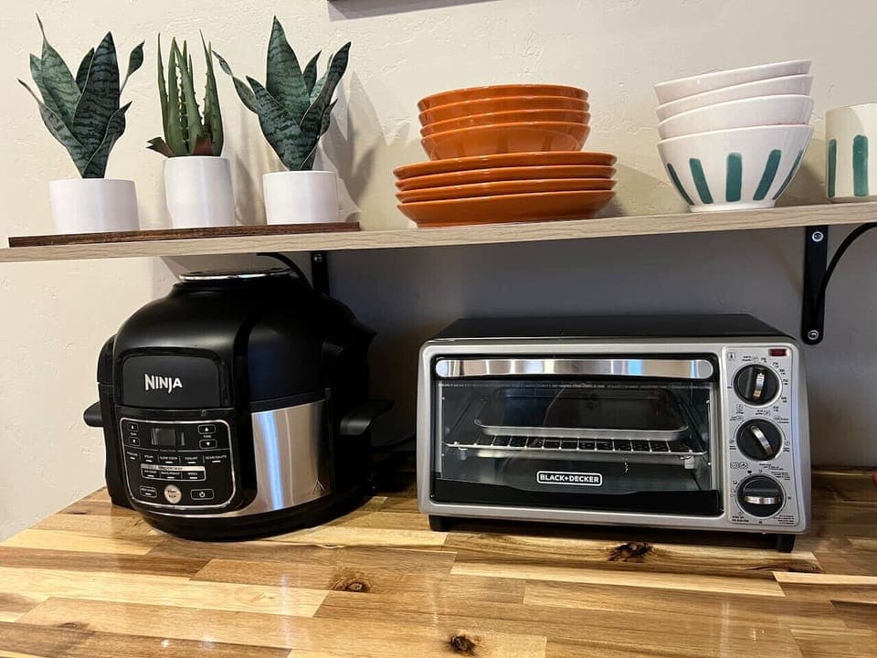 Kitchenette - Crockpot, Dishes, and Toaster Oven