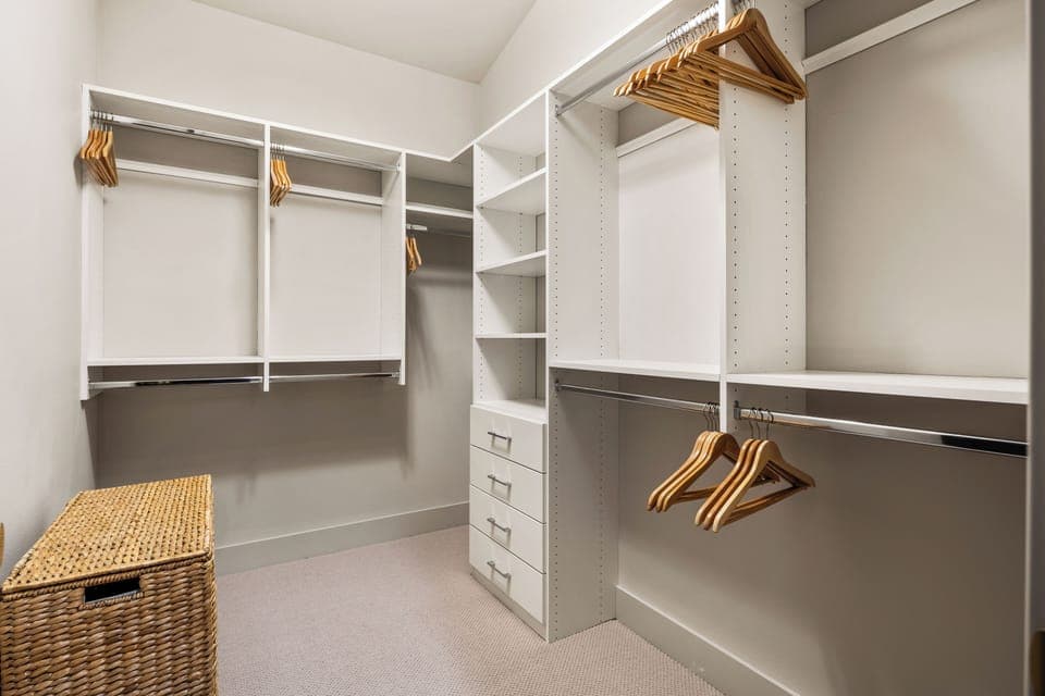 A generous walk-in closet—plenty of room for every outfit and suitcase.