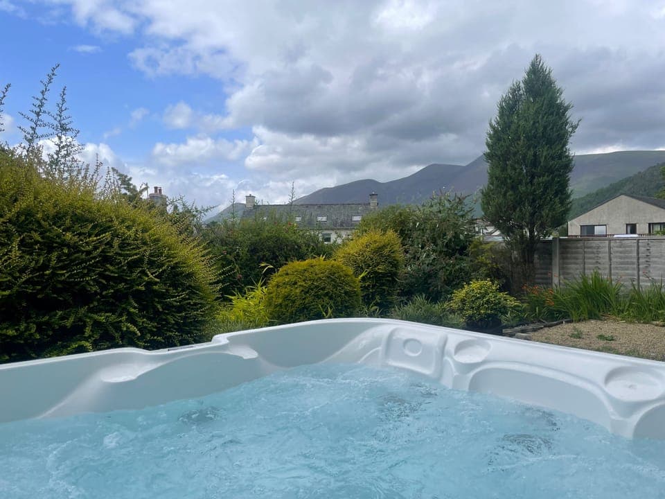 Unwind in the hot tub after a day on the fells.