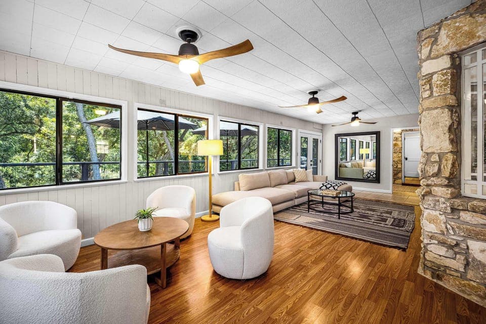 Ample seating in a bright, open living space.