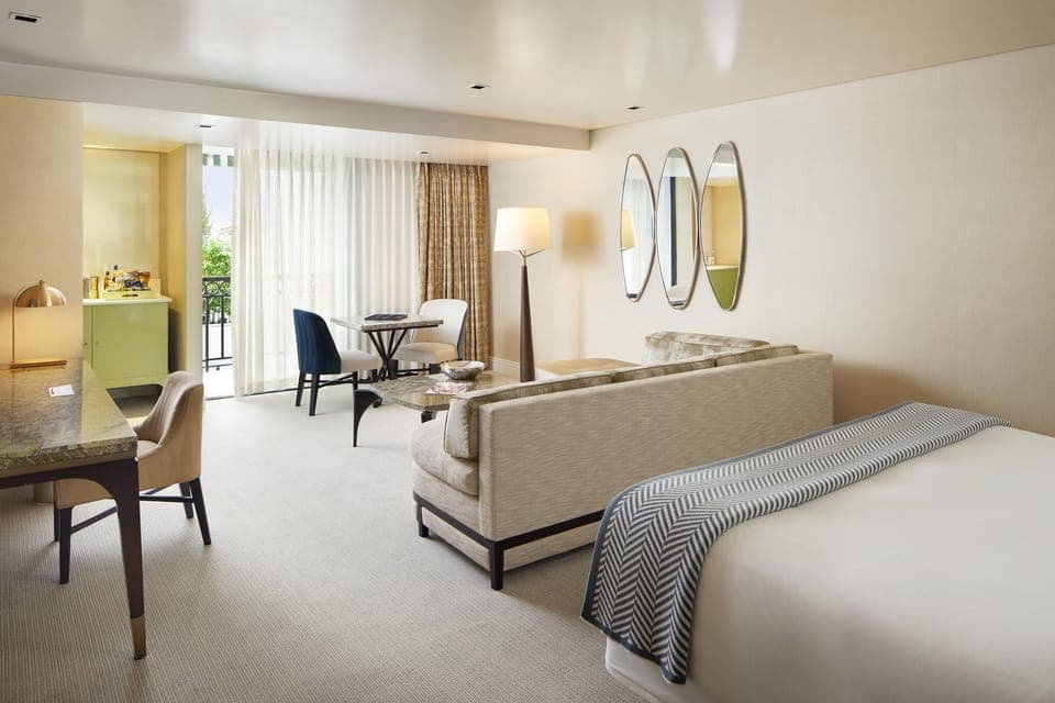 Wake up to soft daylight and lounge by the balcony doors.
