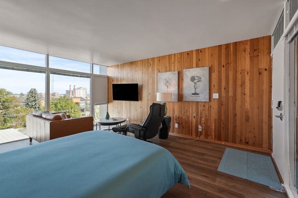 Luxurious linens and designer furnishings make this bedroom a true retreat.