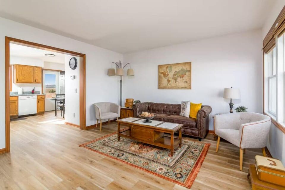 The living room enters directly into the kitchen & dining area