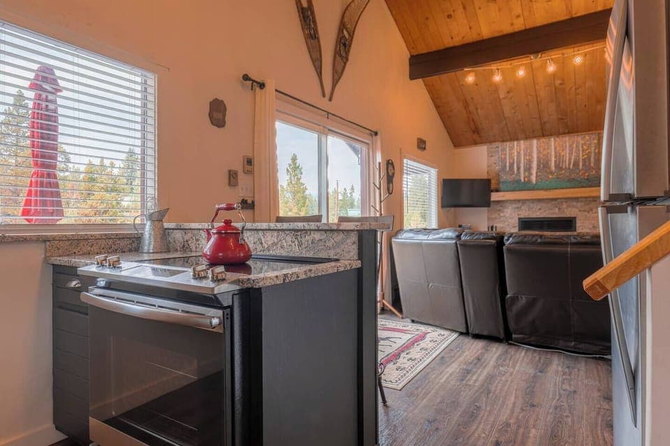 Step outside onto the expansive deck to breathe in the crisp mountain air.