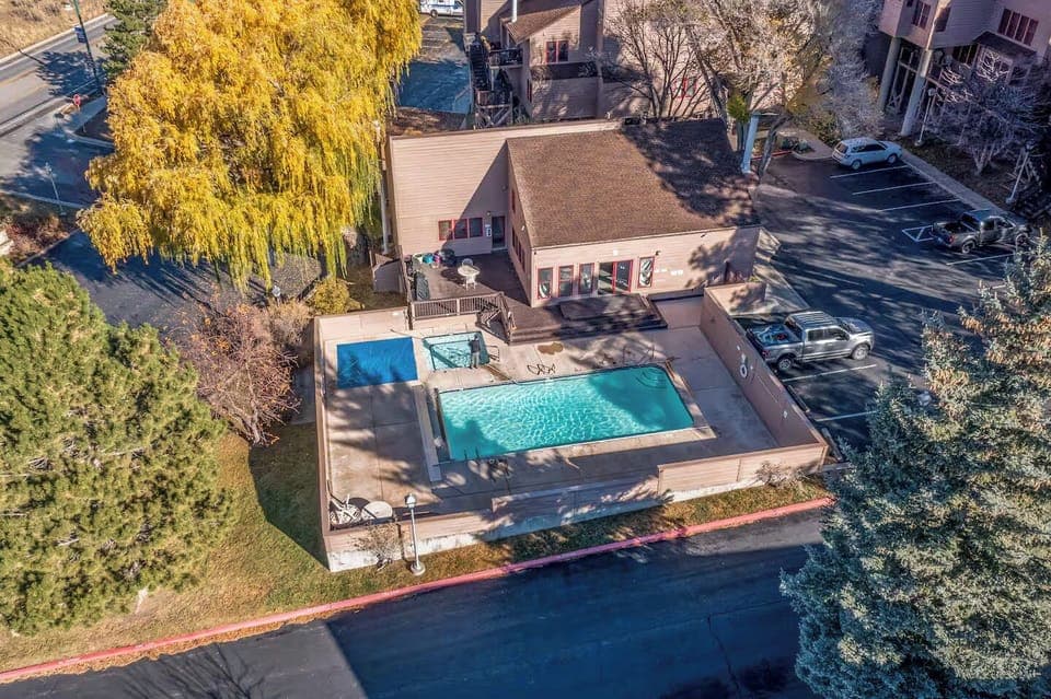 Community pool in front of community. This is the clubhouse, not the unit. 