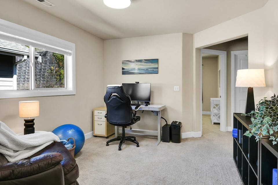 Workspace on the upper level, also with adjustable desk.