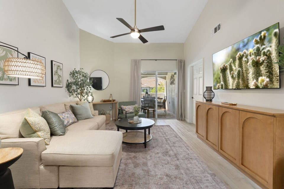Relax in the inviting living room, complete with a chaise sofa, upscale décor, a 65-inch TV, a collection of books and board games for your enjoyment.