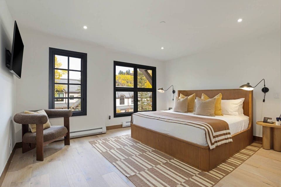 Primary Suite is spacious and appointed with high end modern furnishings.