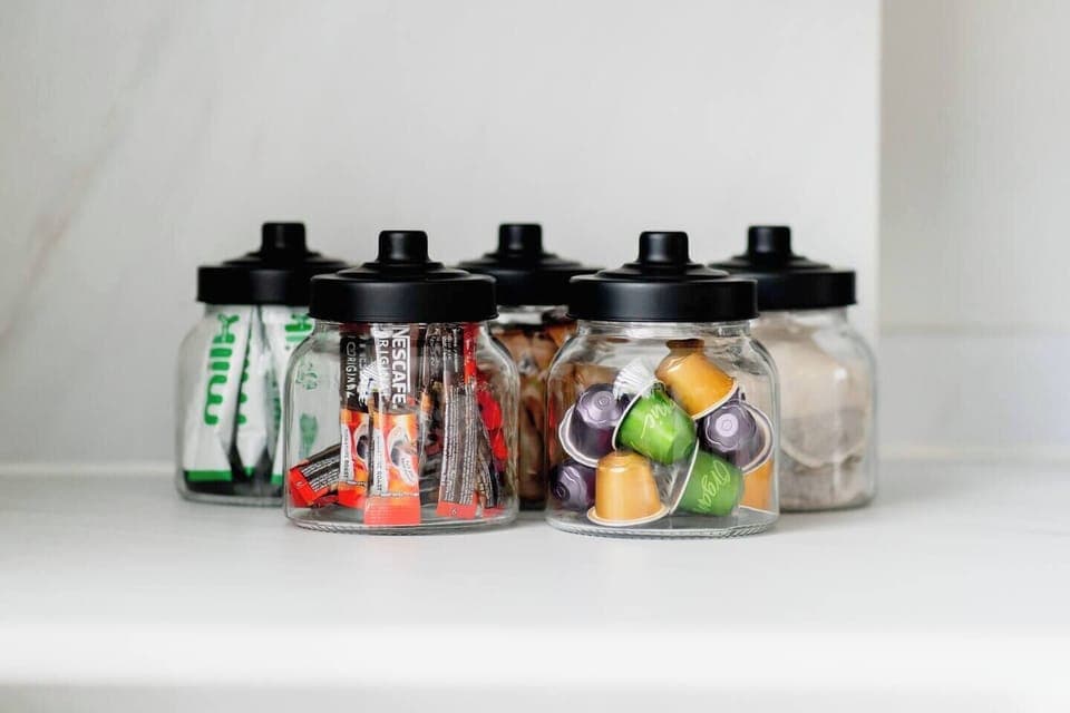 Coffe pods, nescafe coffee, white and brown sugar and teabags are provided for your stay