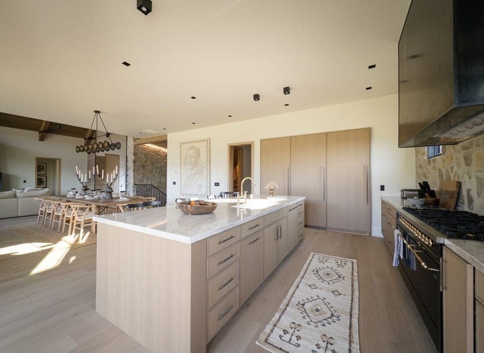 Kitchen with secret entrance to butler's pantry. 